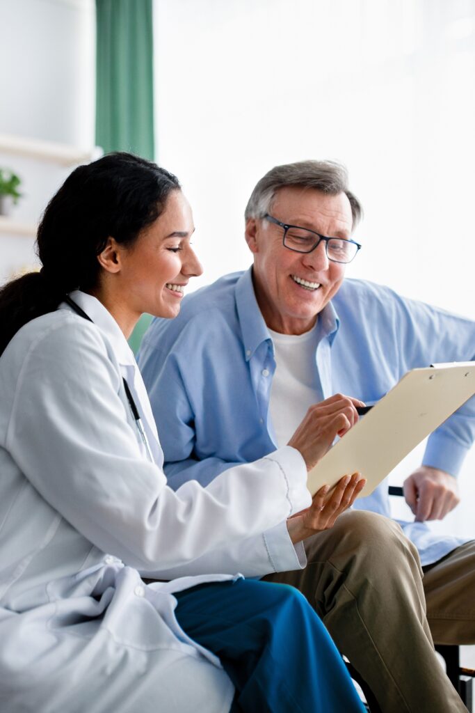 Doctor with patient discussing medical record