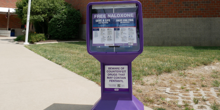 Image of a purple naloxone kiosk